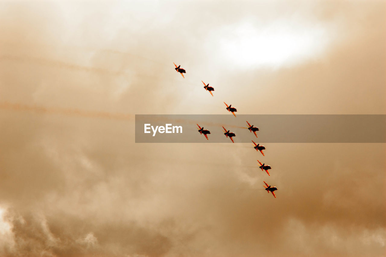 LOW ANGLE VIEW OF AIRSHOW IN SKY