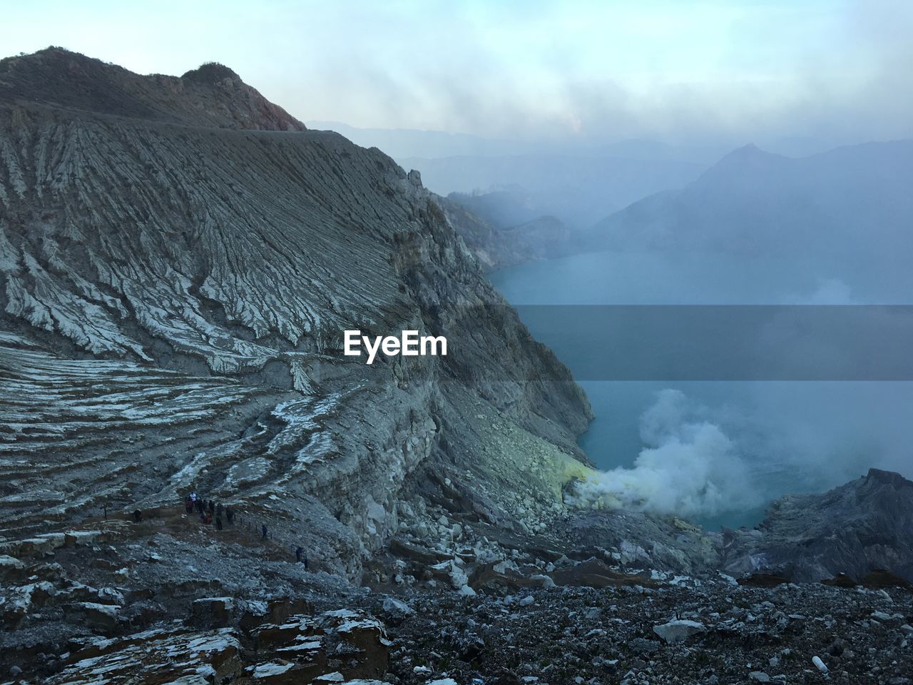 SMOKE EMITTING FROM VOLCANIC LANDSCAPE