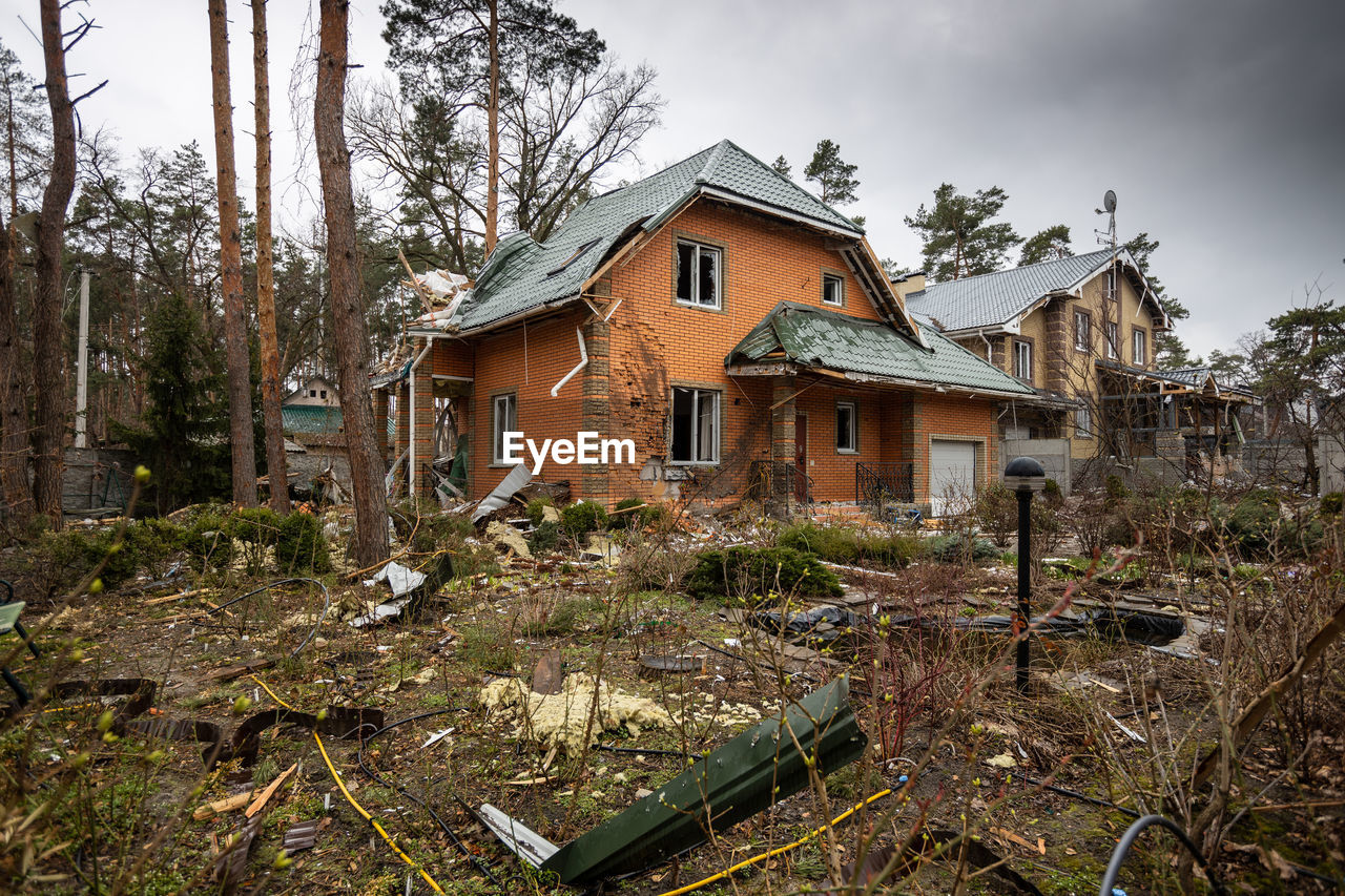 House and yard destroyed by russian missiles, mines, shells.