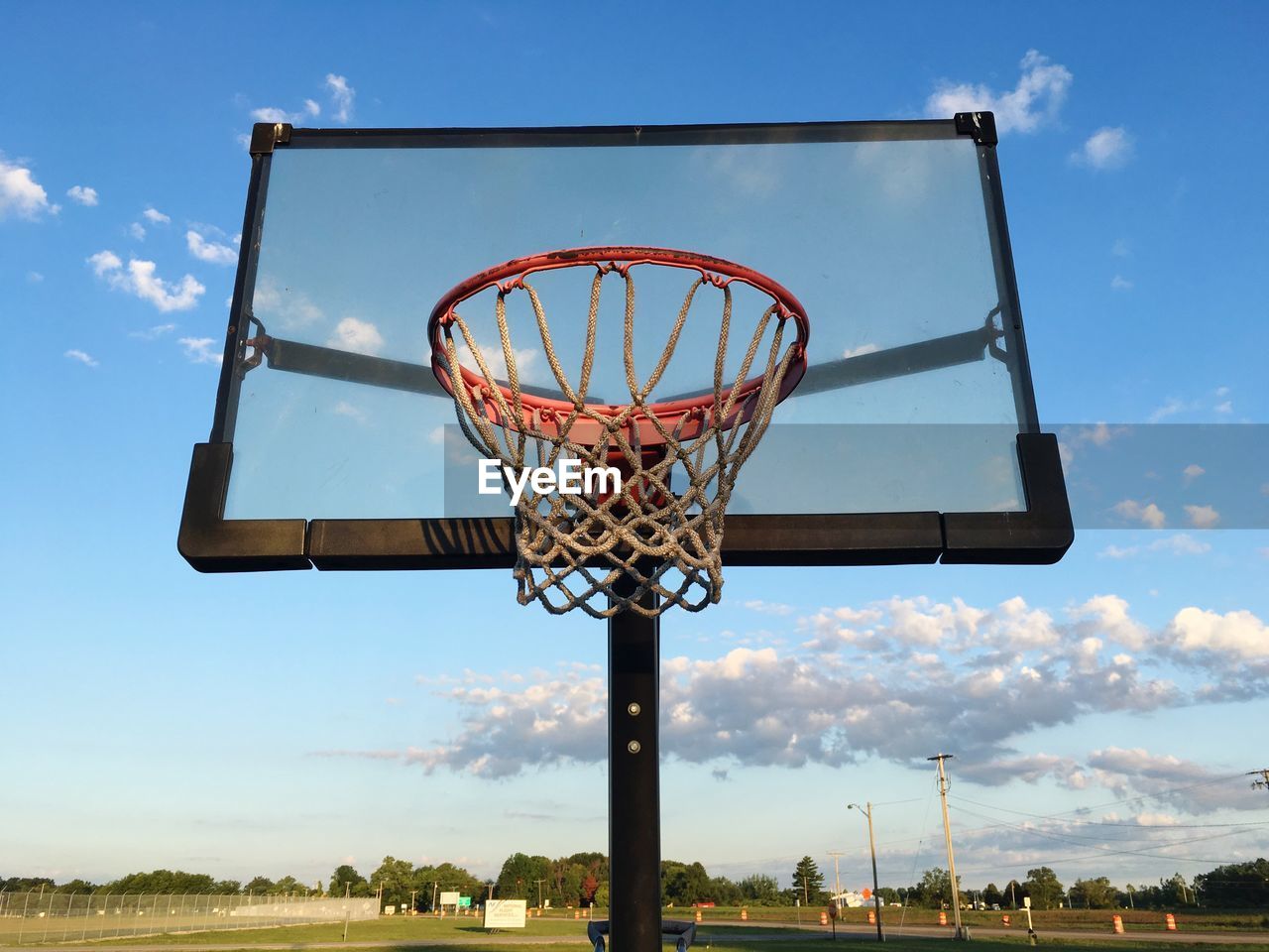 Low angle view of basketball hoop against sky