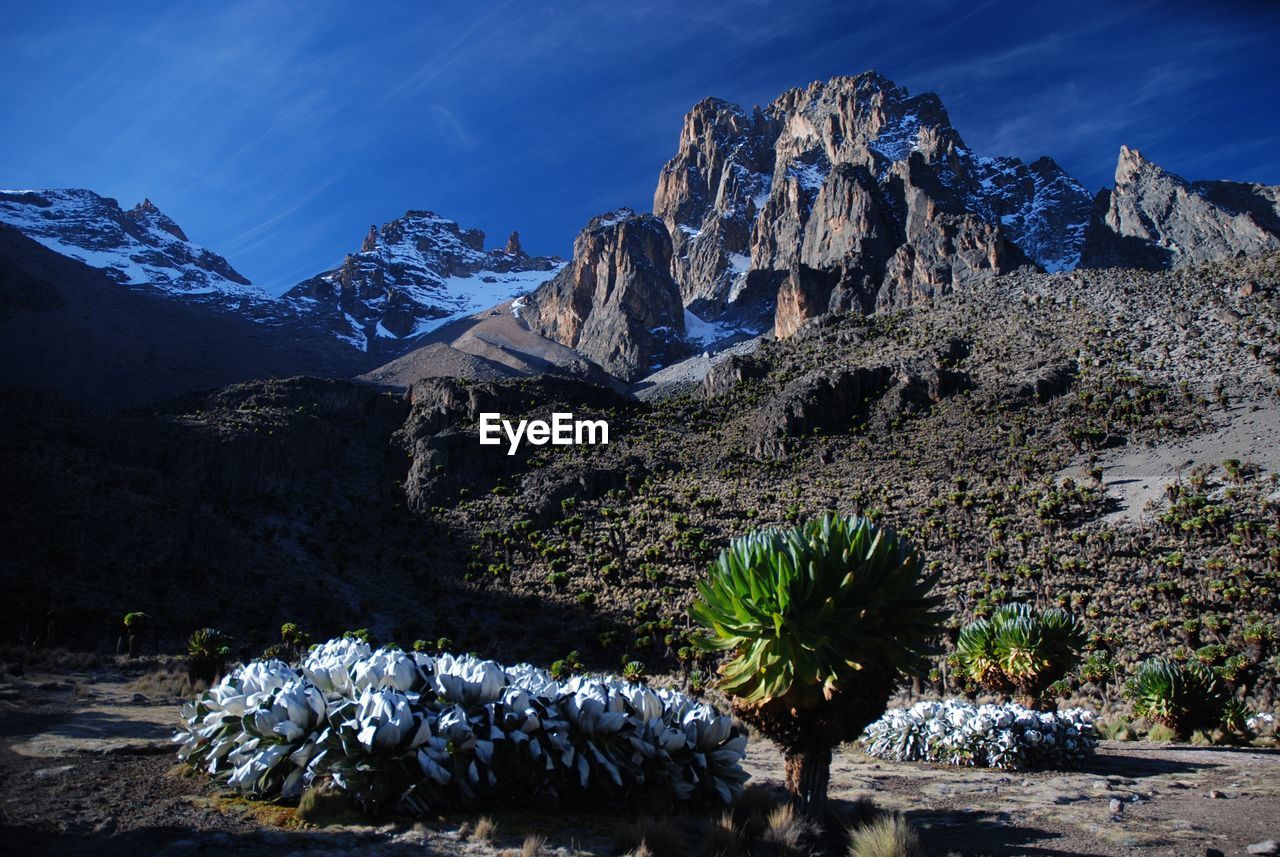 Panoramic view of snowcapped mountains against sky