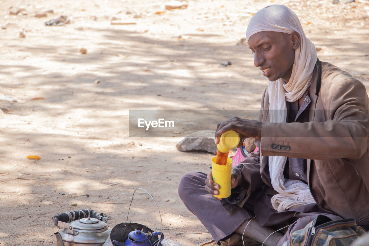 A fulani tribesman selling tea.