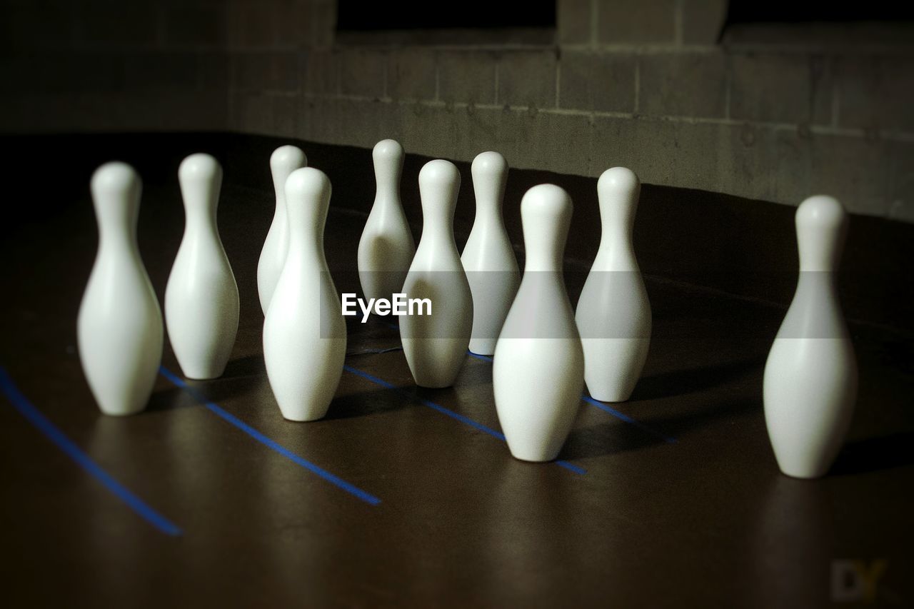 High angle view of bowling pins on floor