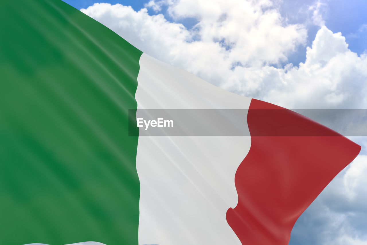 Low angle view of italian flag against sky