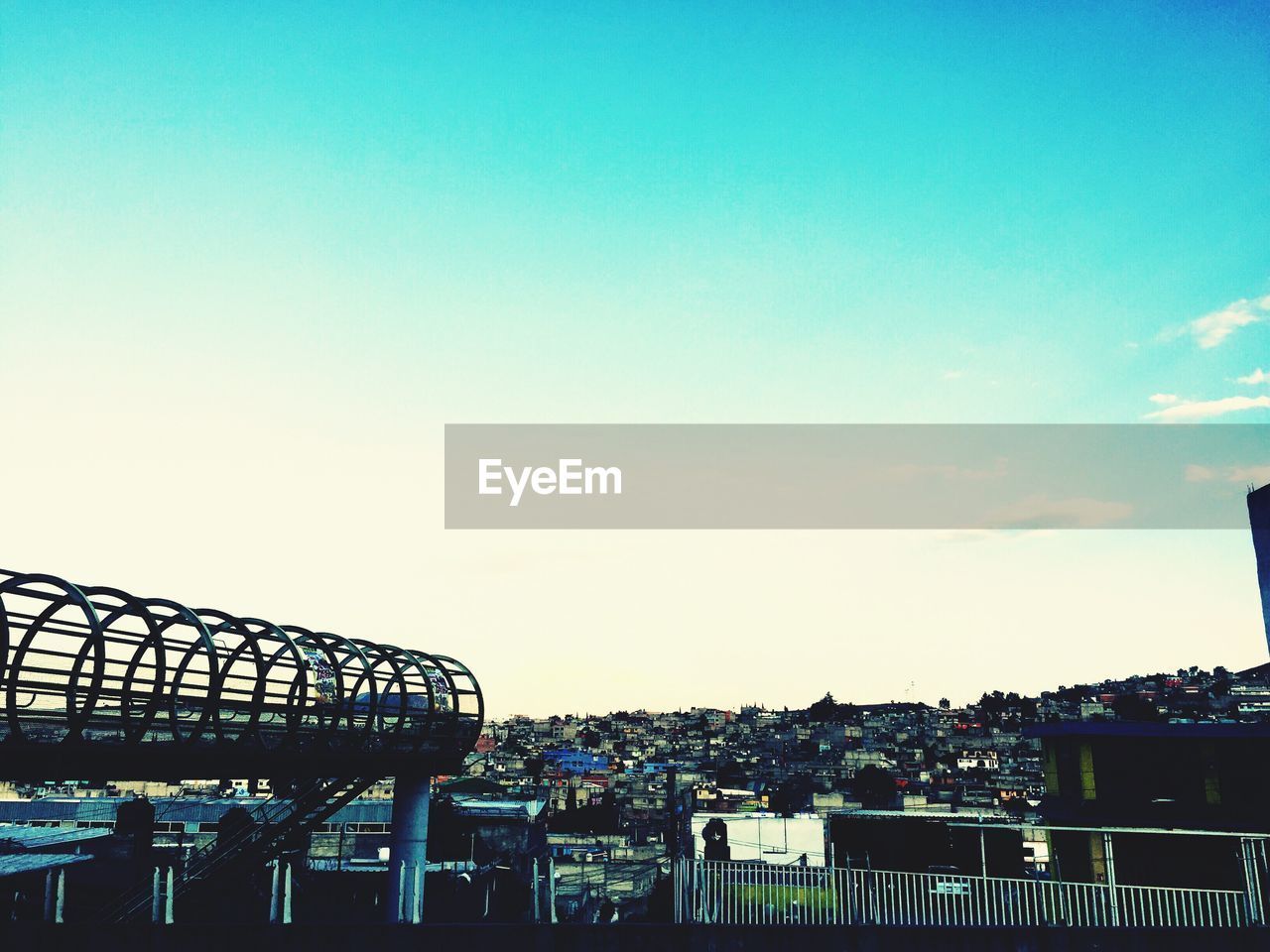 View of buildings against blue sky