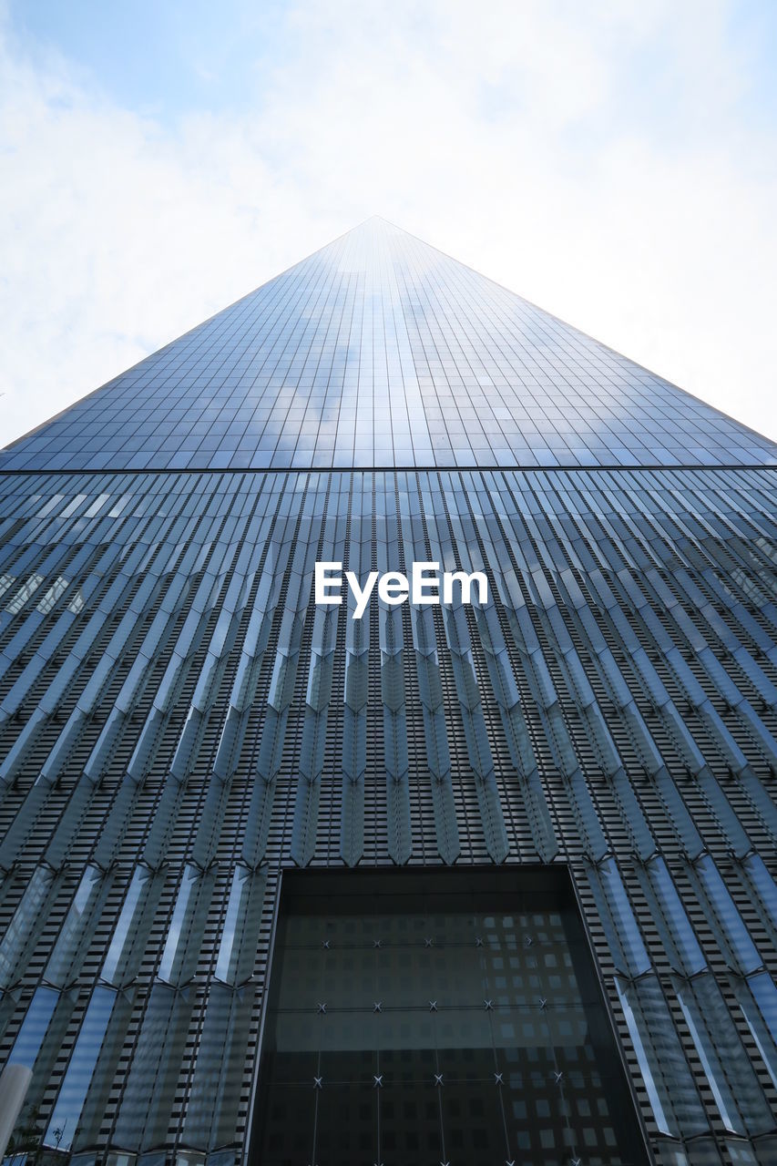 LOW ANGLE VIEW OF MODERN BUILDINGS AGAINST SKY