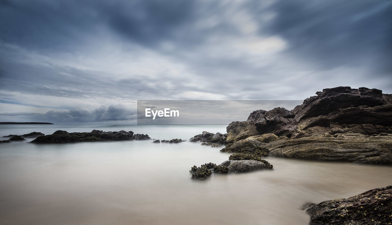 Rocks in calm sea