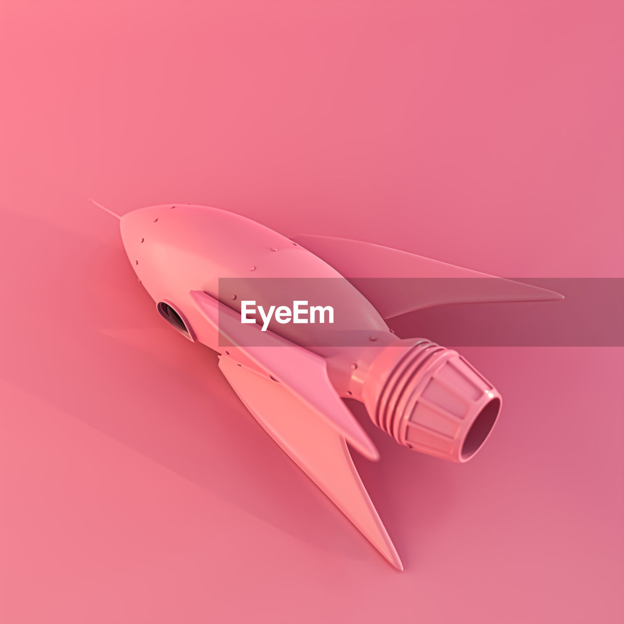 Space rocket isolated on pink background 