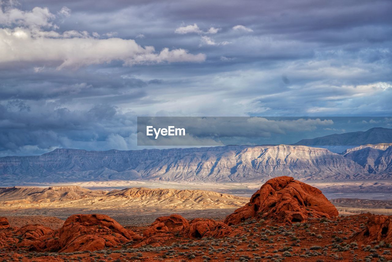 Rock formations on landscape against sky