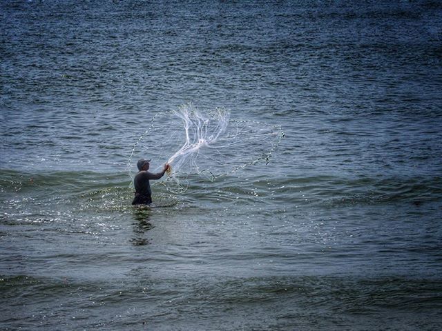 WOMAN IN SEA