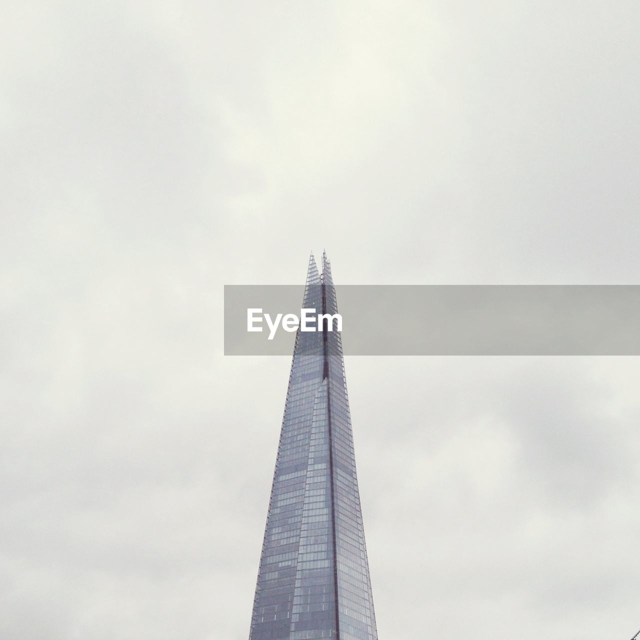 LOW ANGLE VIEW OF SKYSCRAPERS AGAINST SKY