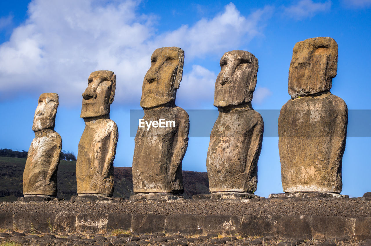 LOW ANGLE VIEW OF SCULPTURES AGAINST SKY