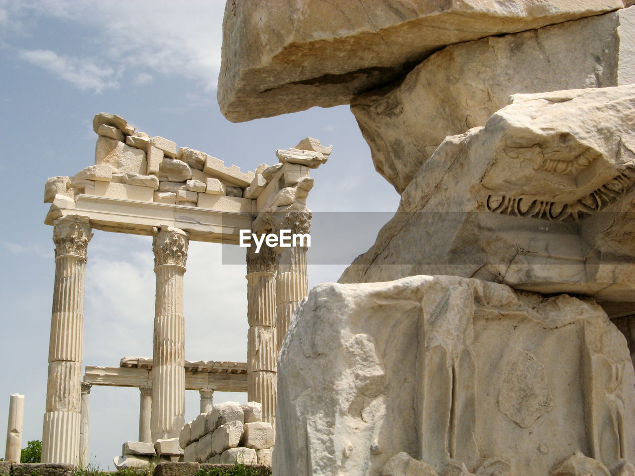 VIEW OF OLD RUINS AGAINST TEMPLE