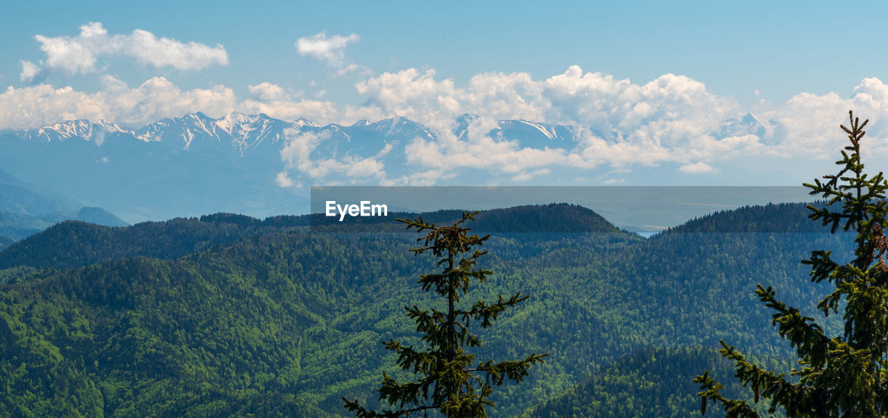 Panoramic view of mountains against sky