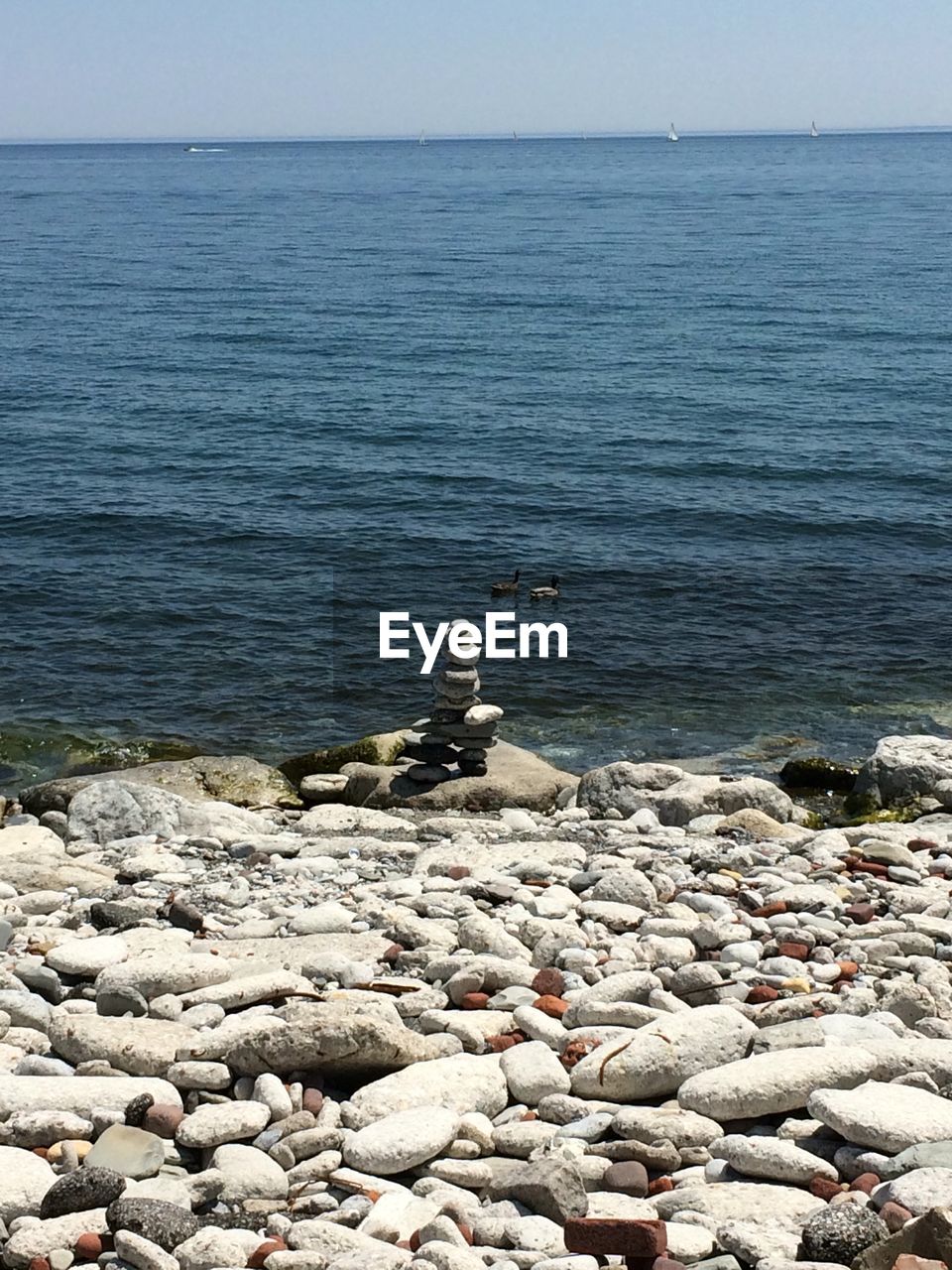 VIEW OF ROCKS IN SEA