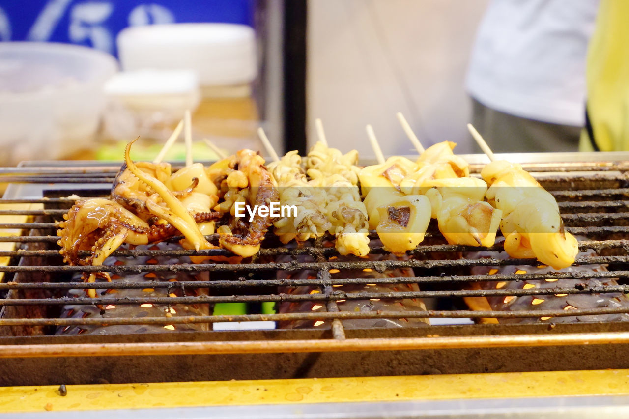 Close-up of food on barbecue grill