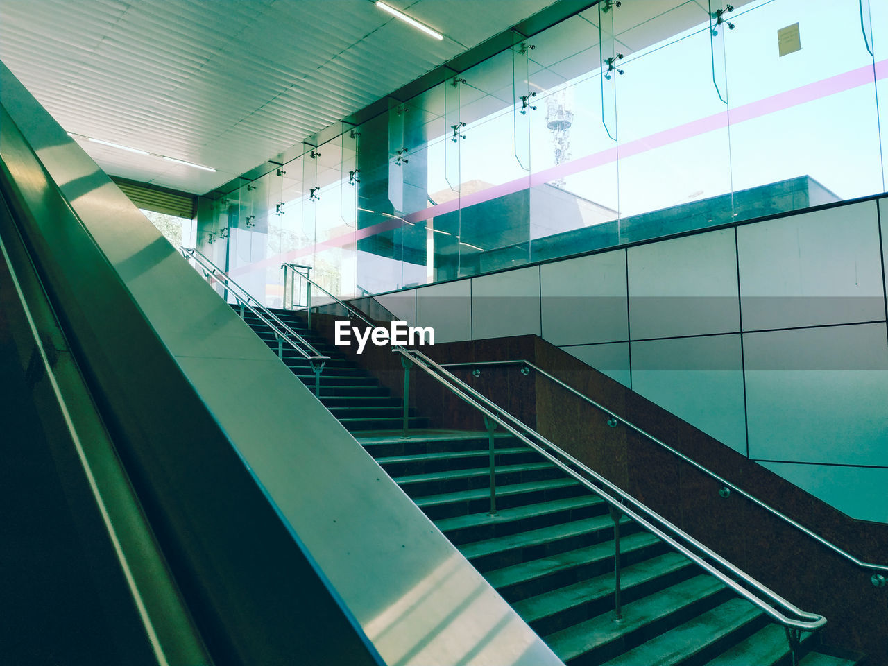 Low angle view of escalator in building