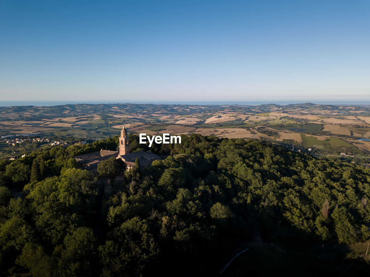 High angle view of cityscape against clear blue sky