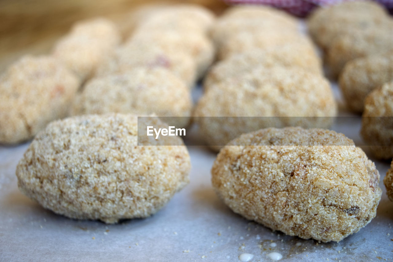 CLOSE-UP OF COOKIES IN CONTAINER