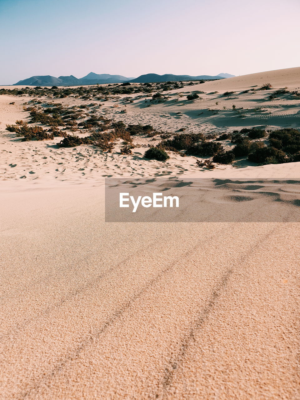 AERIAL VIEW OF DESERT LAND AGAINST SKY