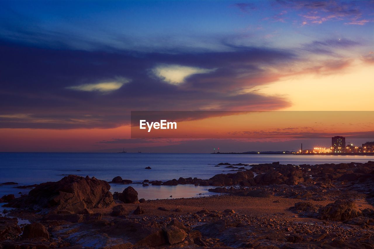 Scenic view of sea against sky during sunset