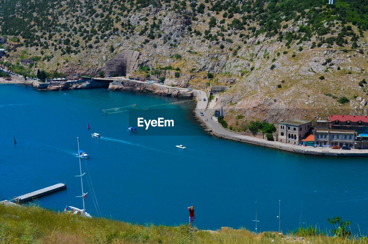 High angle view of sailboats in sea