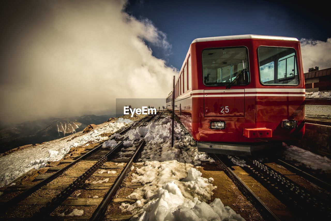 Tourist enjoying scenic view uphill of railway station 