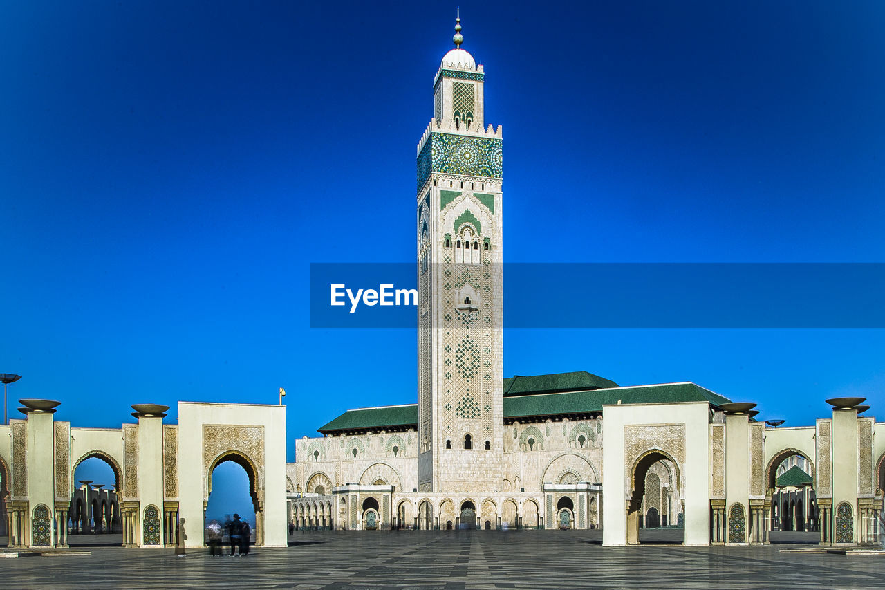 View of mosque against clear blue sky, casablanca morocco 