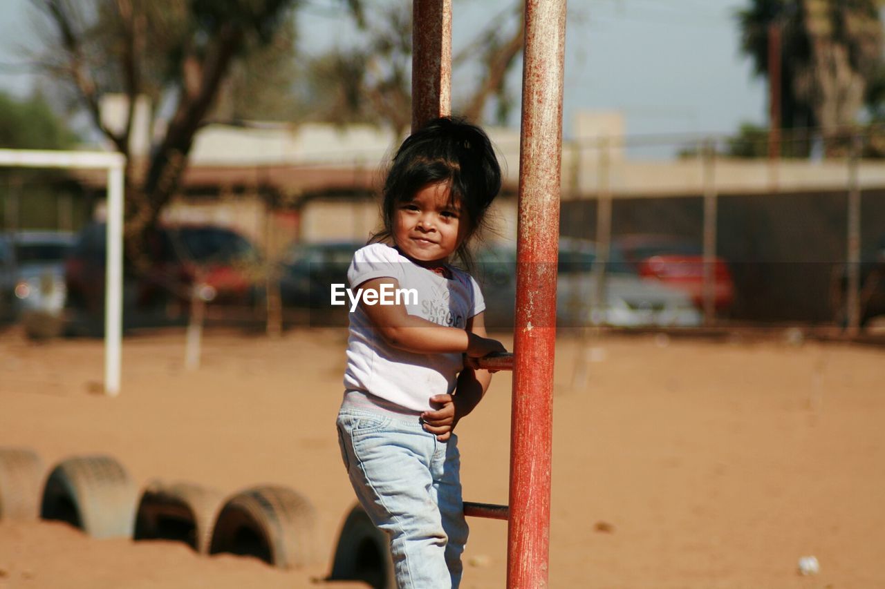 Girl playing in playground