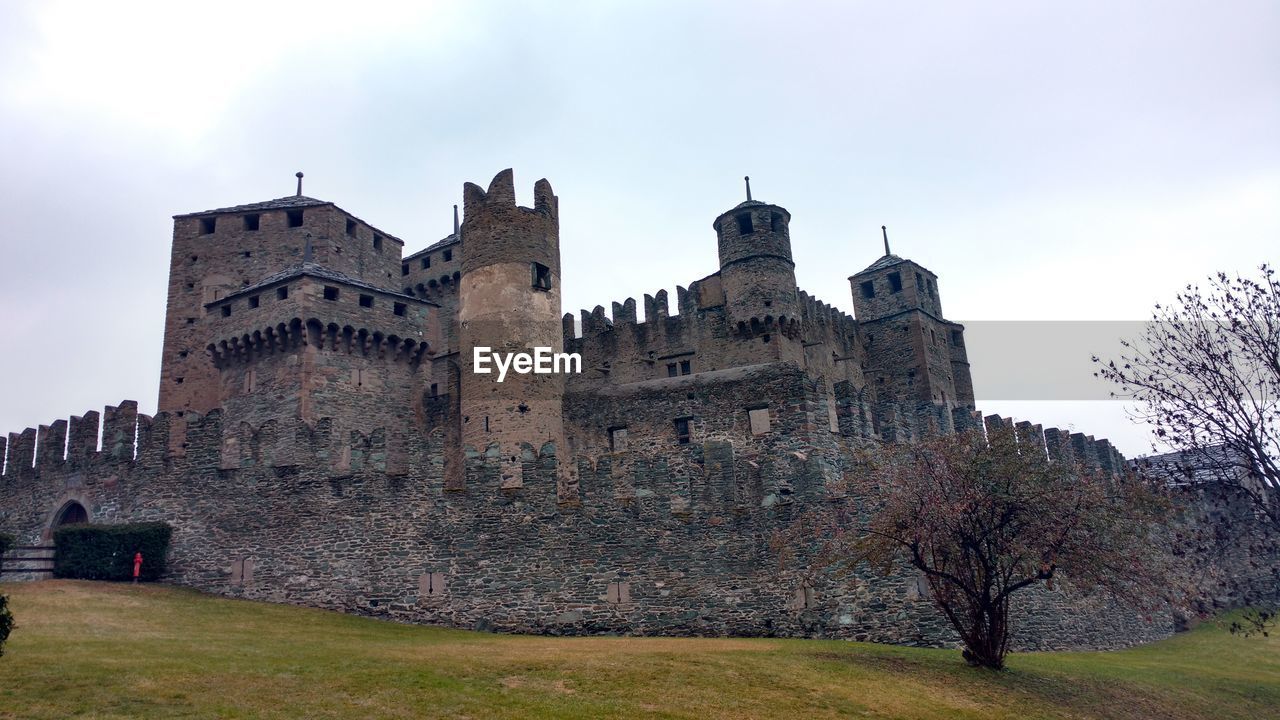 Low angle view of historic building against sky