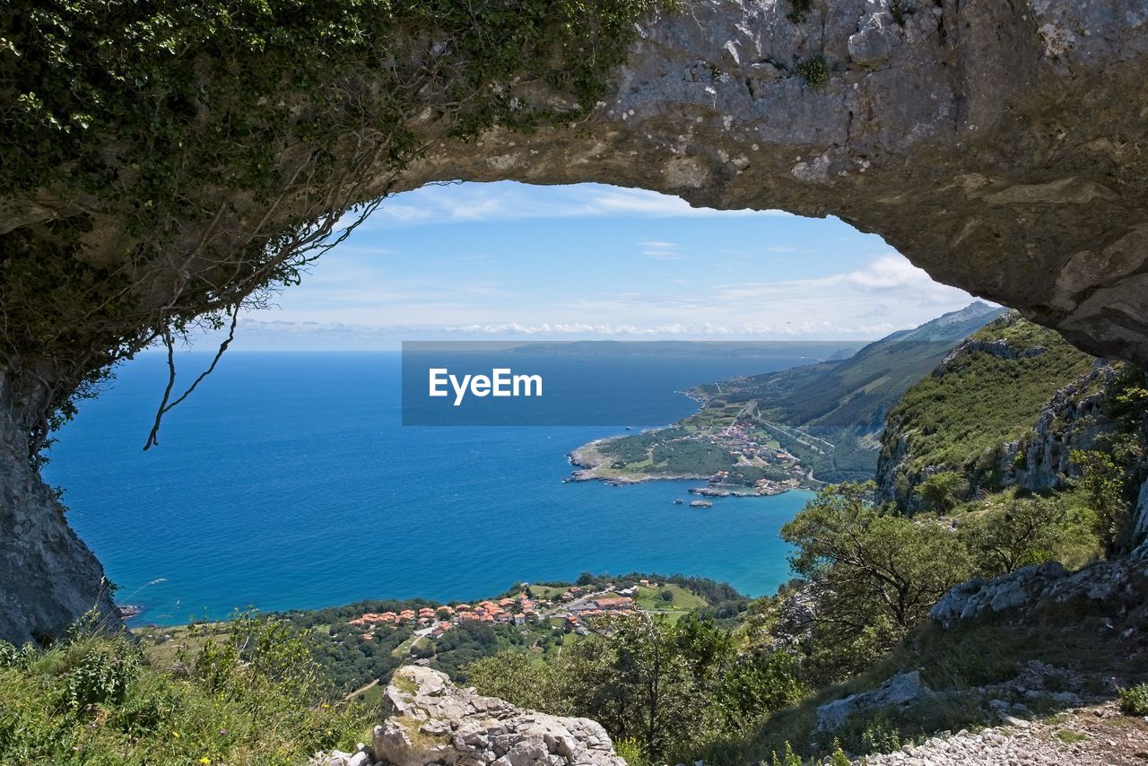A huge natural arch in the rock on top of the mountain in spain