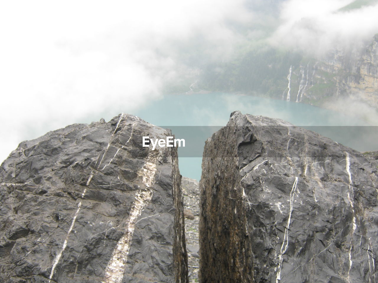 Close-up of rocks against sky