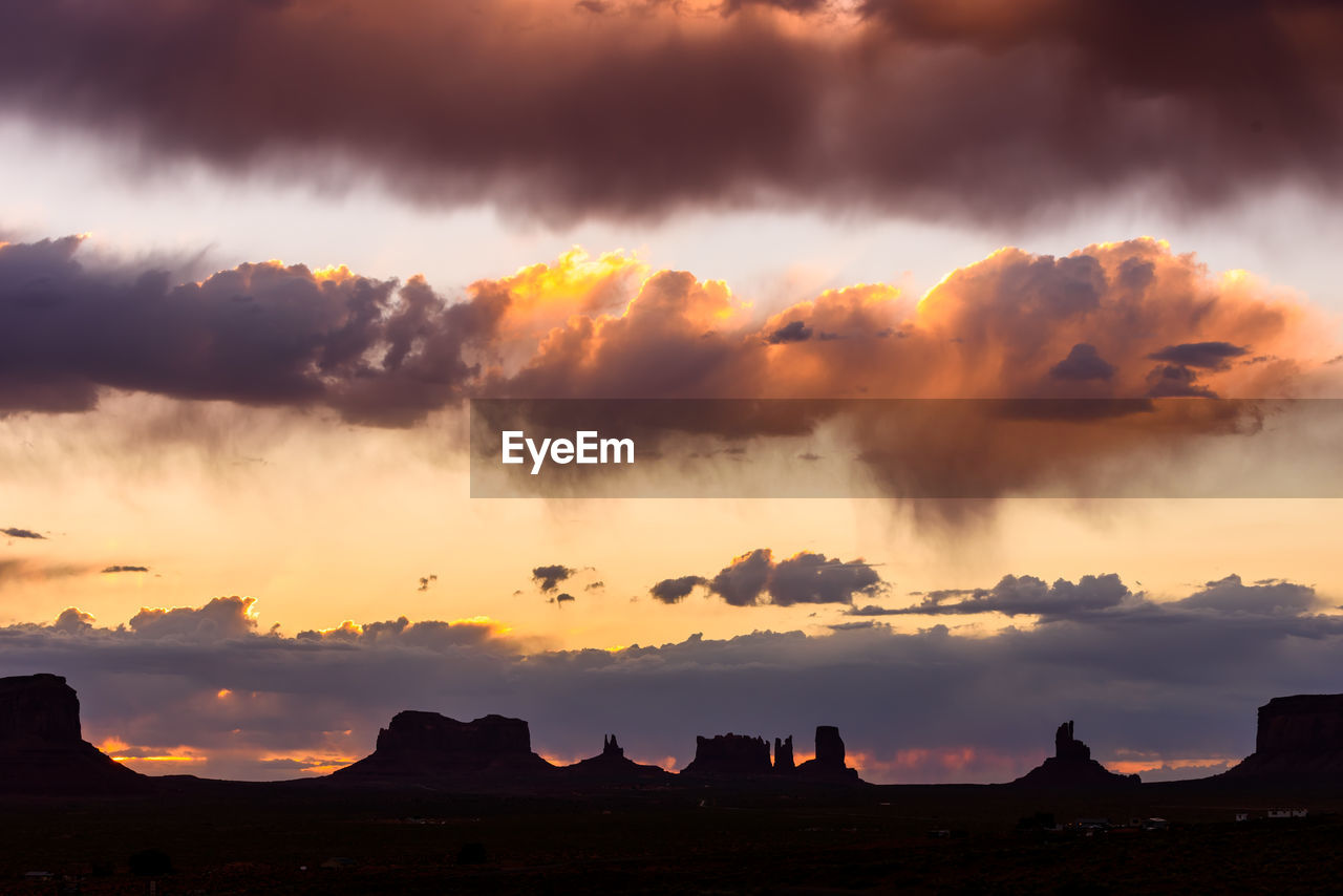 Scenic view of dramatic sky during sunset