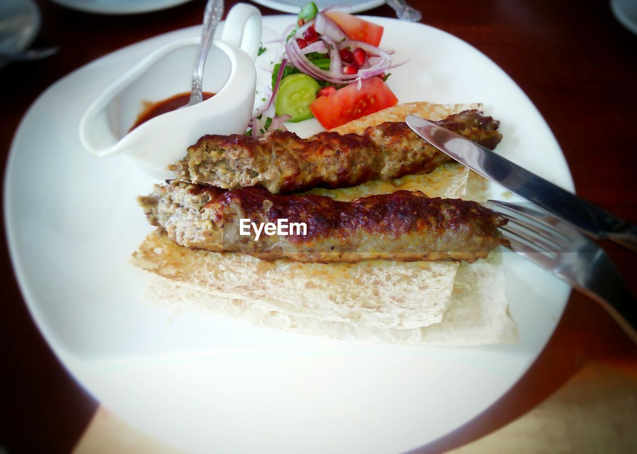 CLOSE-UP OF SERVED FOOD