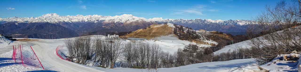 Wide angle view on the italian and swiss alps from mottarone