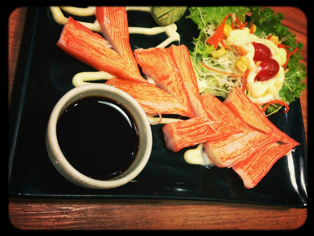 CLOSE-UP OF SERVED FOOD ON TABLE