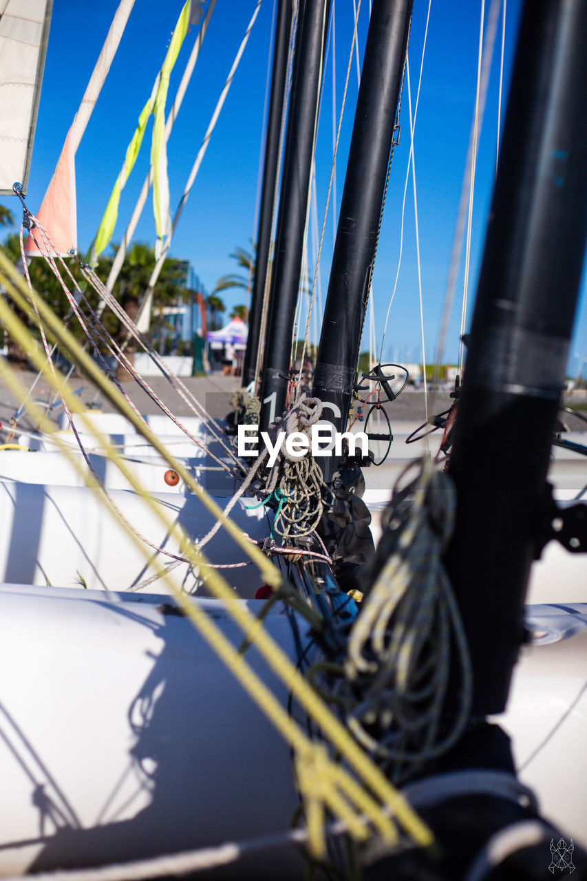 vehicle, transportation, sailing, sailboat, mode of transportation, nautical vessel, rope, sailing ship, boat, ship, mast, sea, no people, water, nature, sky, watercraft, day, rigging, blue, bicycle, pole, outdoors, selective focus