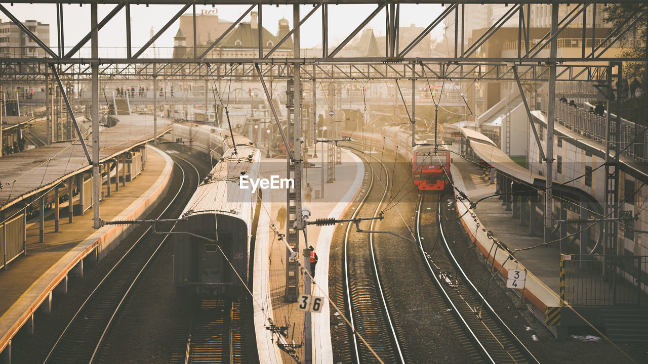 HIGH ANGLE VIEW OF RAILROAD TRACKS AT STATION