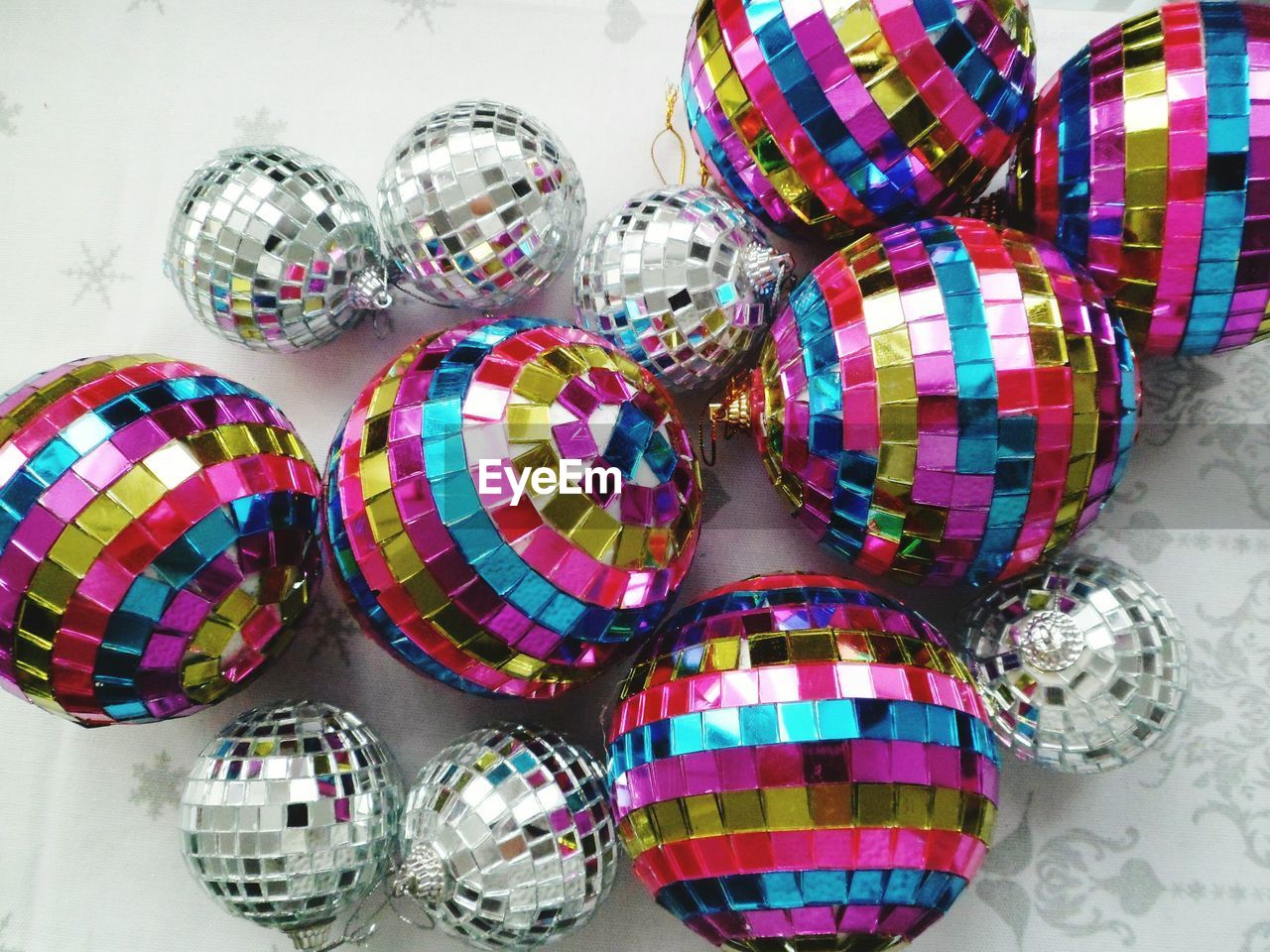 High angle view of colorful baubles on table