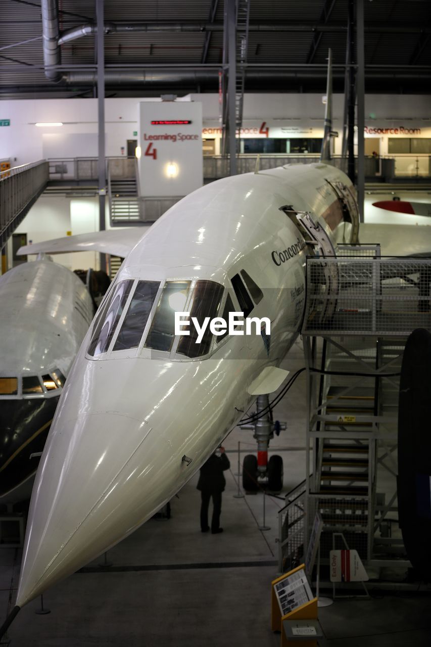 VIEW OF AIRPLANE IN AIRPORT