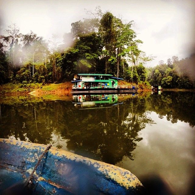 VIEW OF BOATS IN RIVER