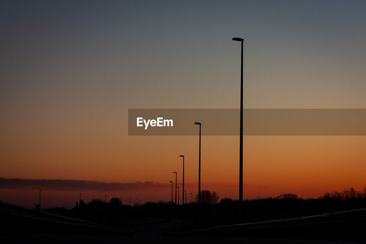 STREET AGAINST SKY DURING SUNSET