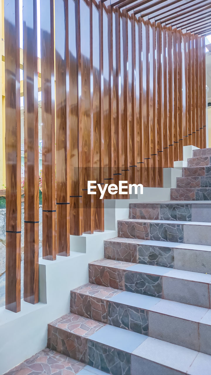 architecture, stairs, staircase, baluster, wood, built structure, no people, steps and staircases, interior design, in a row, day, outdoors, handrail, building, pattern