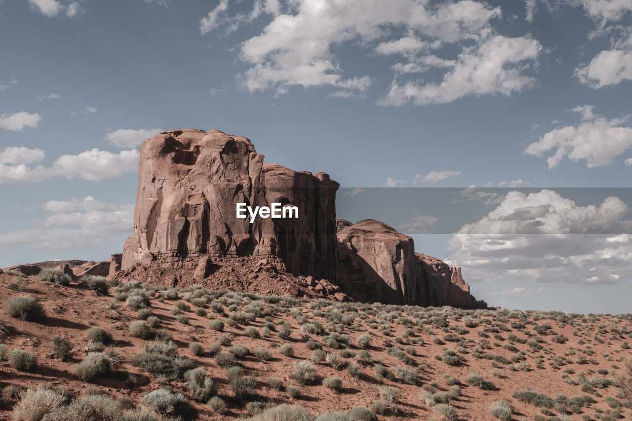 Rock formations on landscape against sky. monument valley