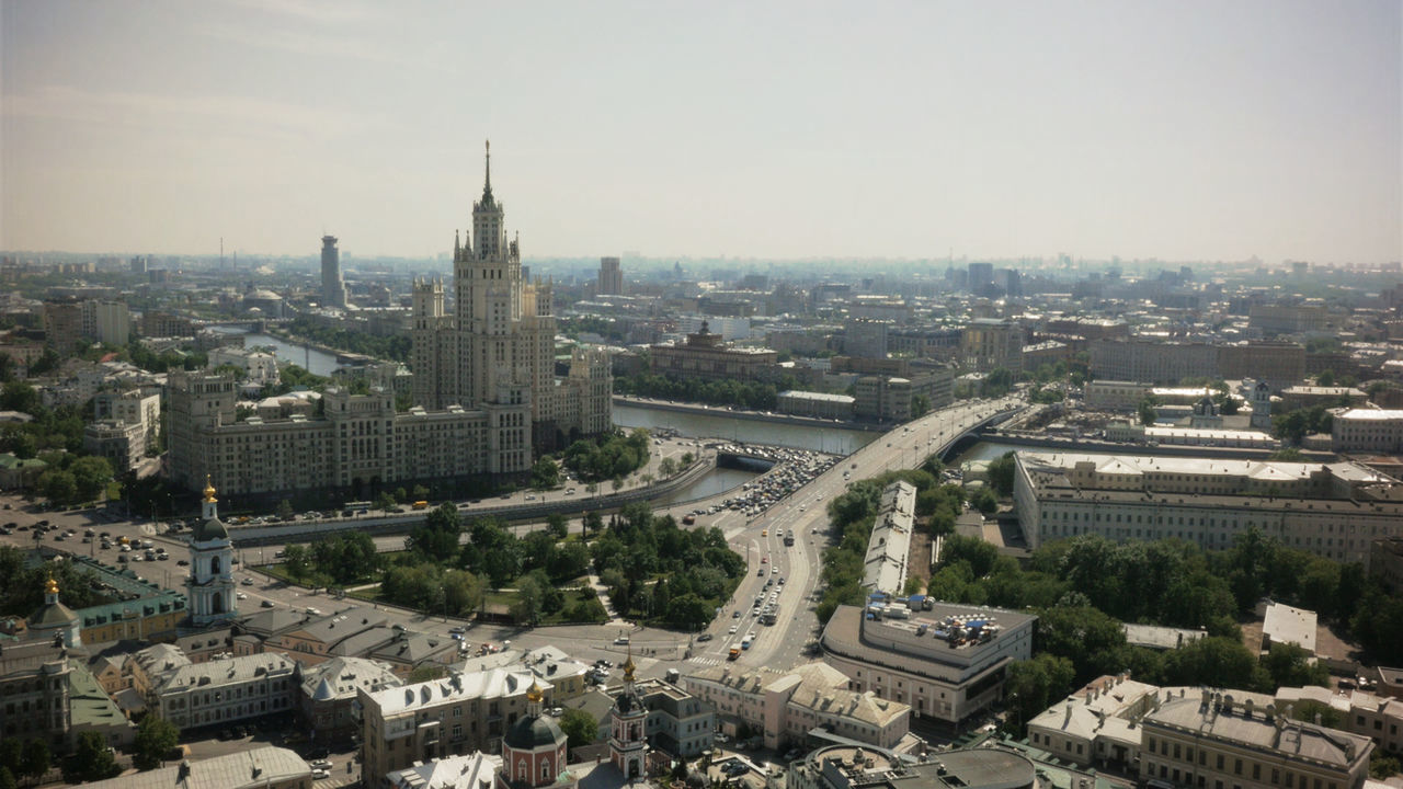 Aerial view of cityscape against sky