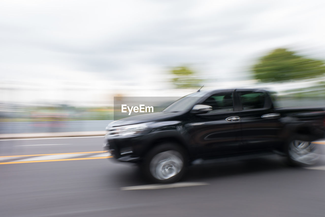 CARS MOVING ON ROAD