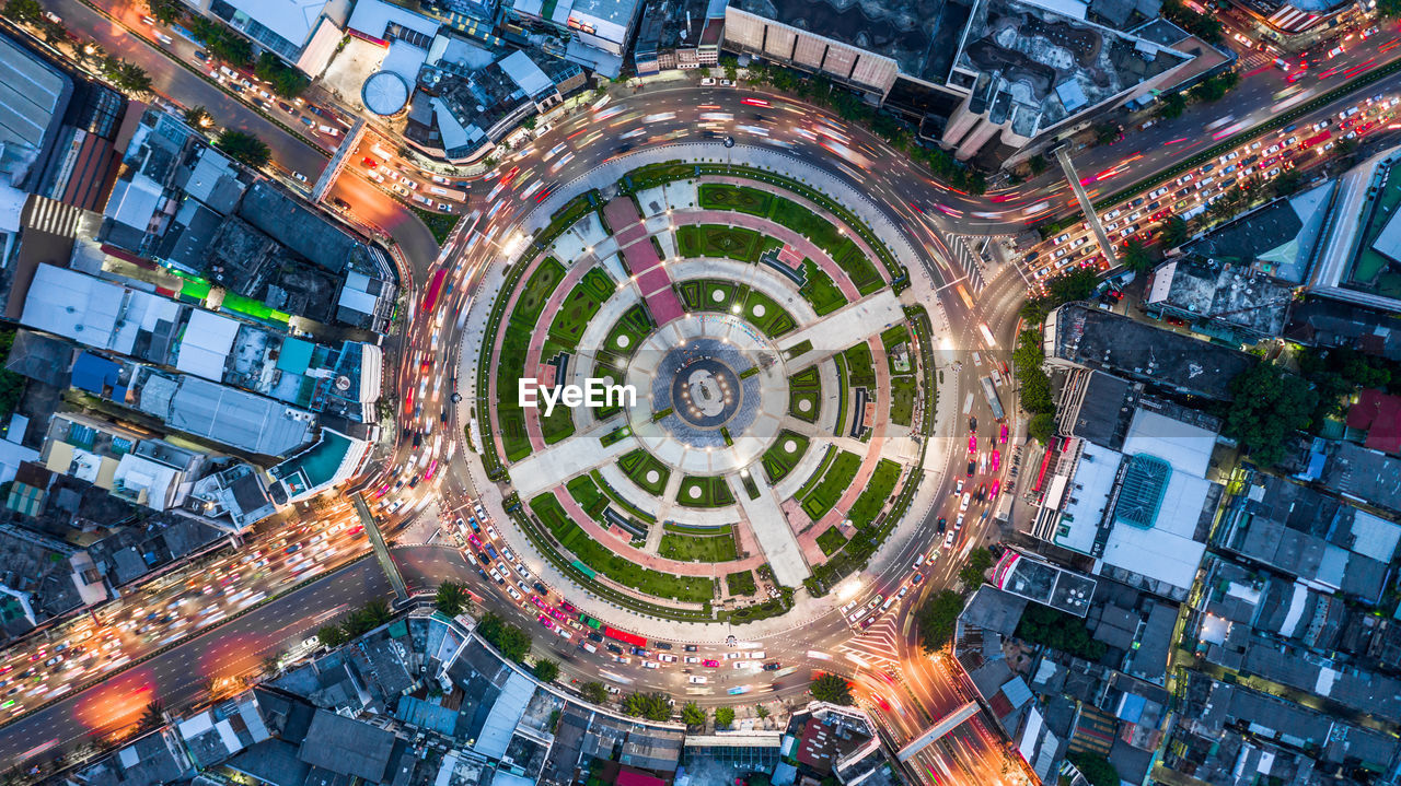 High angle view of illuminated buildings in city