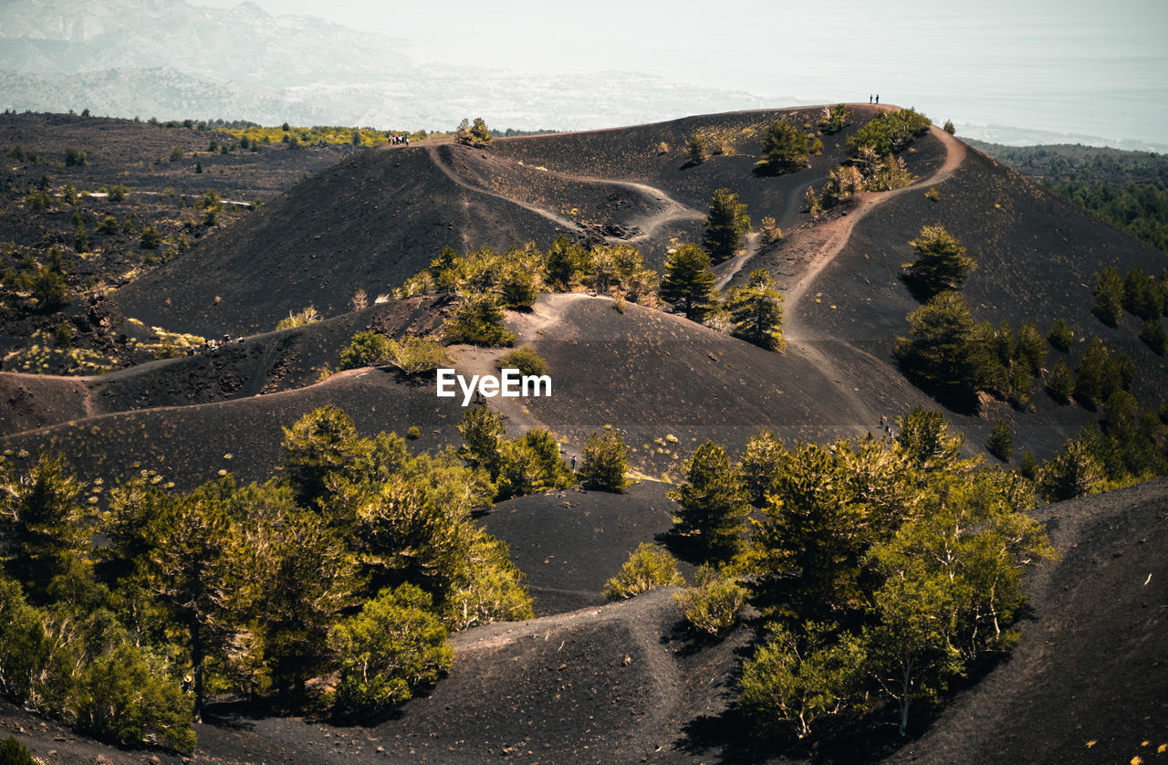 Mount etna's seven volcanic craters and ethereal geological formations.