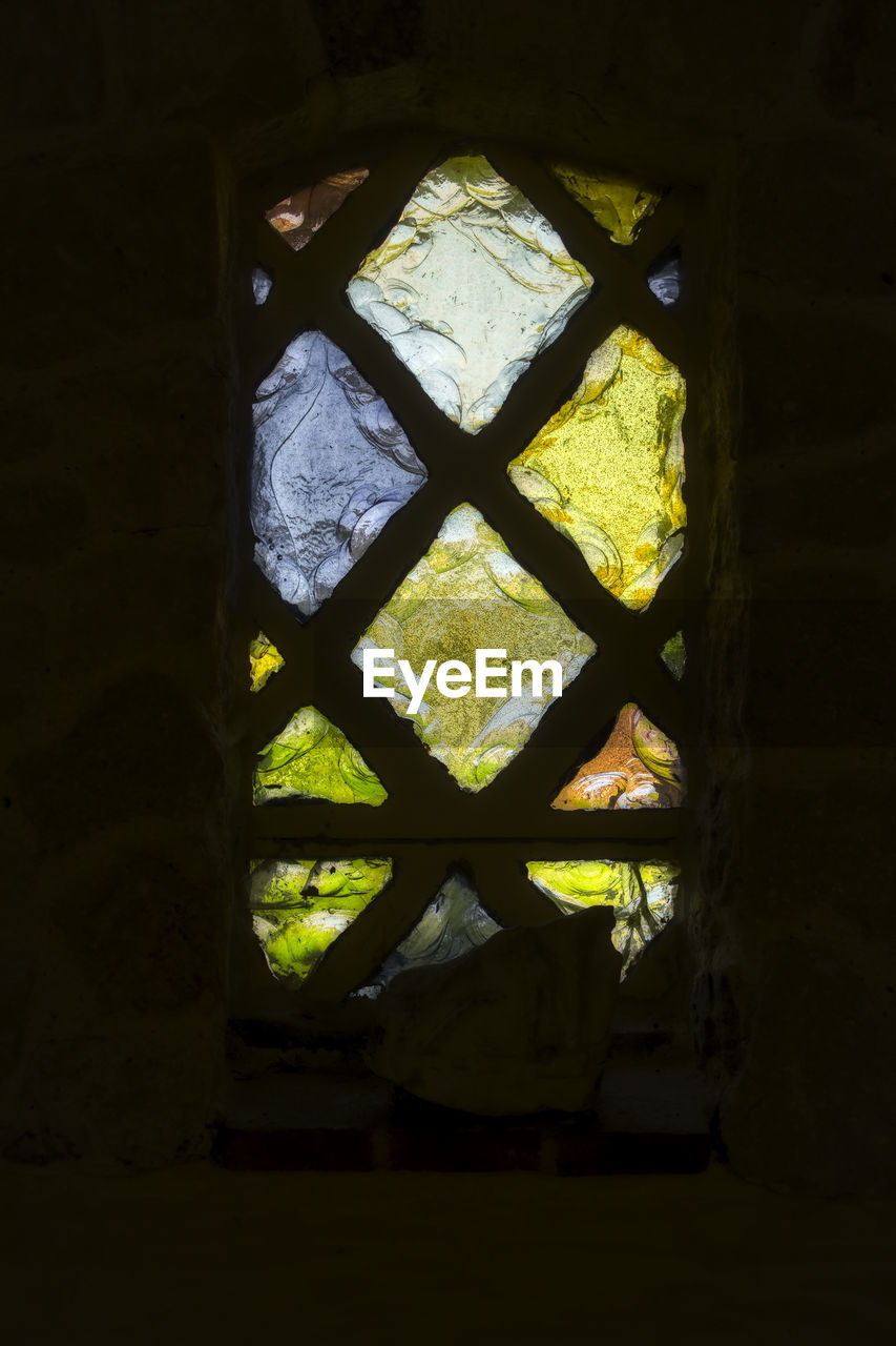 CLOSE-UP OF ABANDONED WINDOW