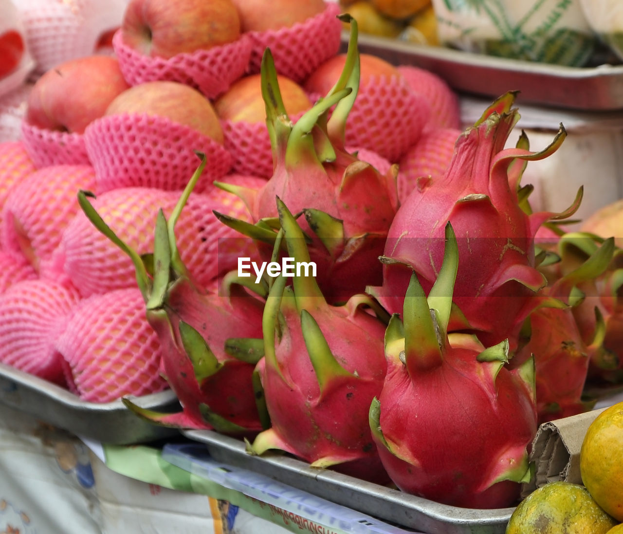 HIGH ANGLE VIEW OF FRUITS FOR SALE IN MARKET STALL